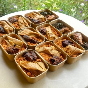 Jollof rice, moinmoin served with 1 pepper  chicken