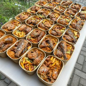 Jollof rice, fried rice, dodo, 1 peppered fish, 1 chicken